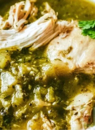 Healthy Anti-Inflammatory Chicken Green Chile dish garnished with fresh herbs.