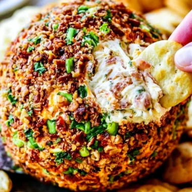 Delicious Bacon Ranch Cheese Ball served with crackers and veggies