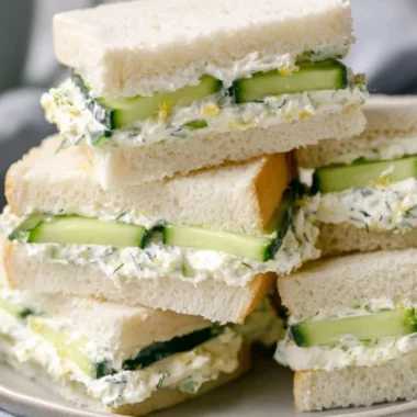 Delicious cucumber sandwich on a plate, perfect for tea time or light lunch.