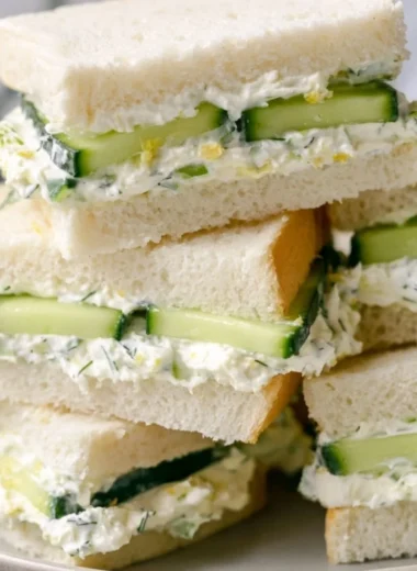 Delicious cucumber sandwich on a plate, perfect for tea time or light lunch.