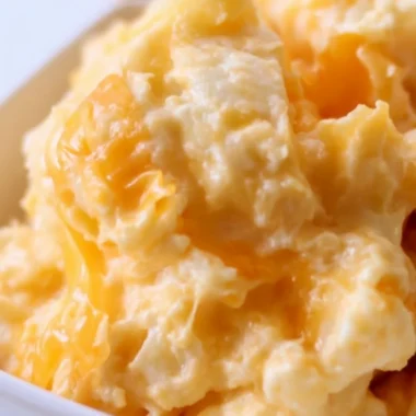 Delicious easy cheesy potato casserole baked until golden and bubbly.
