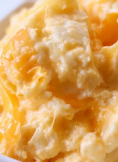 Delicious easy cheesy potato casserole baked until golden and bubbly.