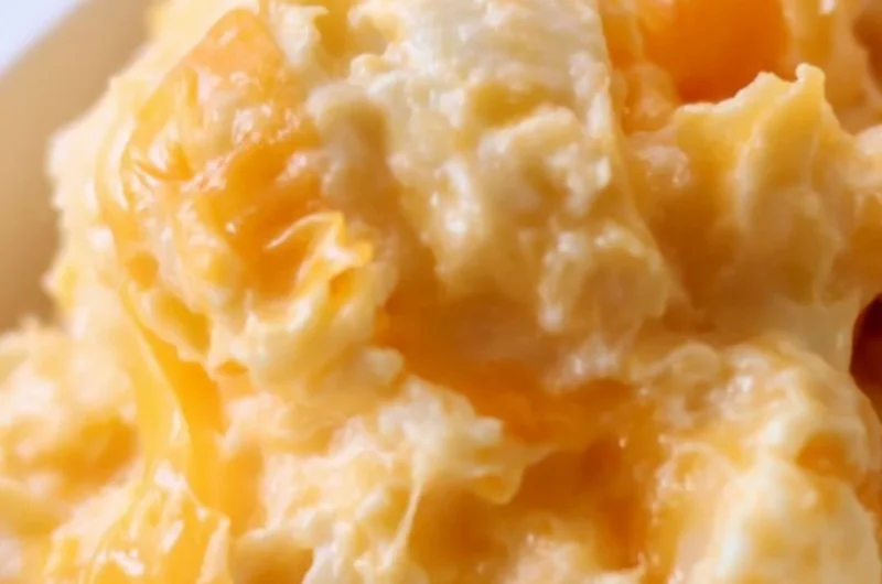 Delicious easy cheesy potato casserole baked until golden and bubbly.