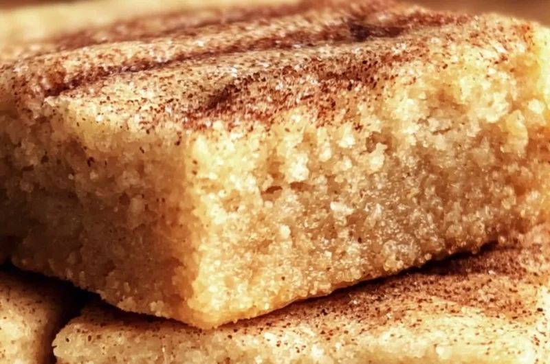 Delicious chewy snickerdoodle cookie bars with a sweet cinnamon topping