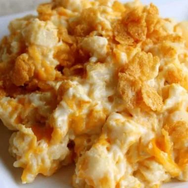 Delicious platter of funeral potatoes, a creamy potato casserole dish.