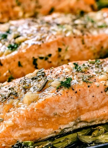 Delicious garlic butter baked salmon served on a plate