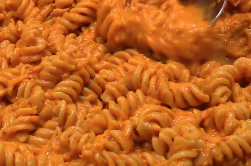 Delicious high protein creamy tomato pasta served in a bowl